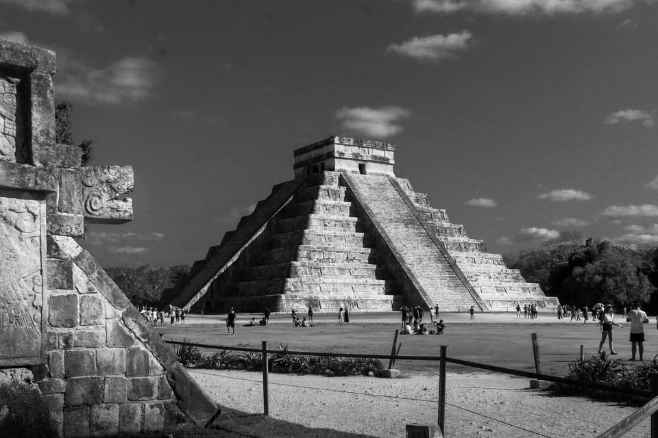 grayscale photo of el castillo mayan pyramid